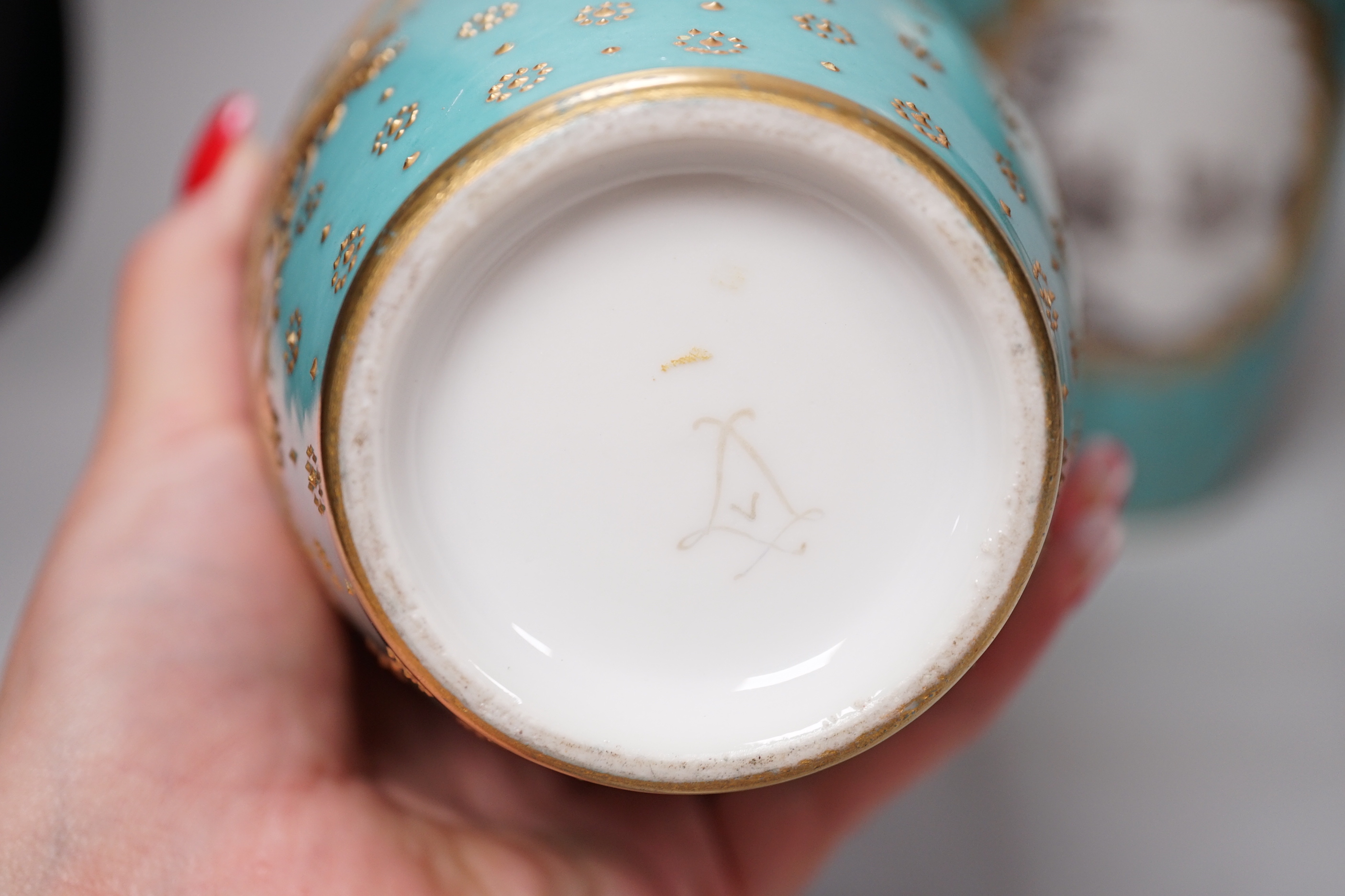 A pair of late 19th century Sevres style turquoise ground vases and covers, 24cm